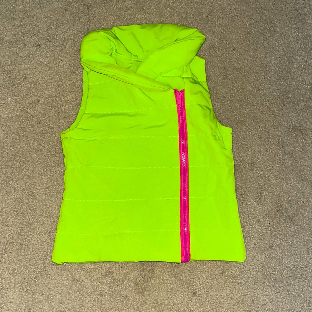A lime green and purple vest. You could use it for new styles or as a costume.